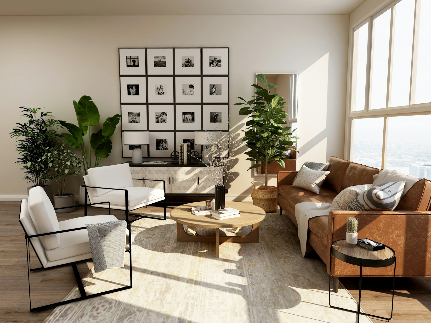 Bright living room in a completed addition, with a gallery wall and full-height windows